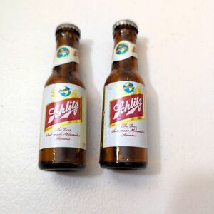 Vintage beer bottles by Schultz.
